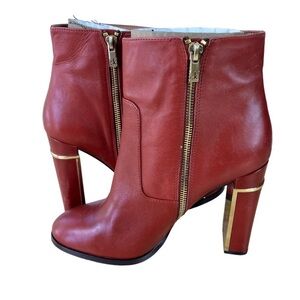 Calvin Klein size 10 Karlia dark red leather boots with gold detailed heel